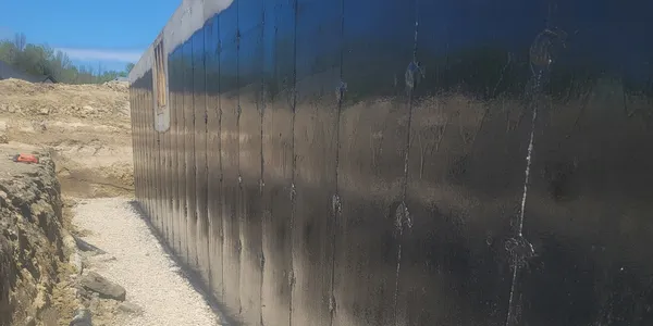 Foundation damp proofing application